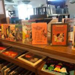 a shelf of halloween books for kids at thomas beaver free library